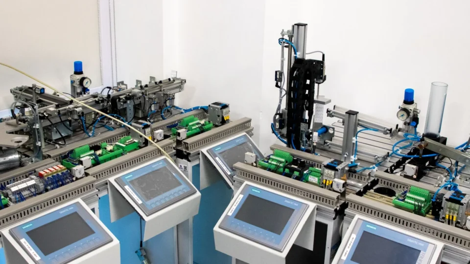 High-tech industrial automation system with control panels indoors.