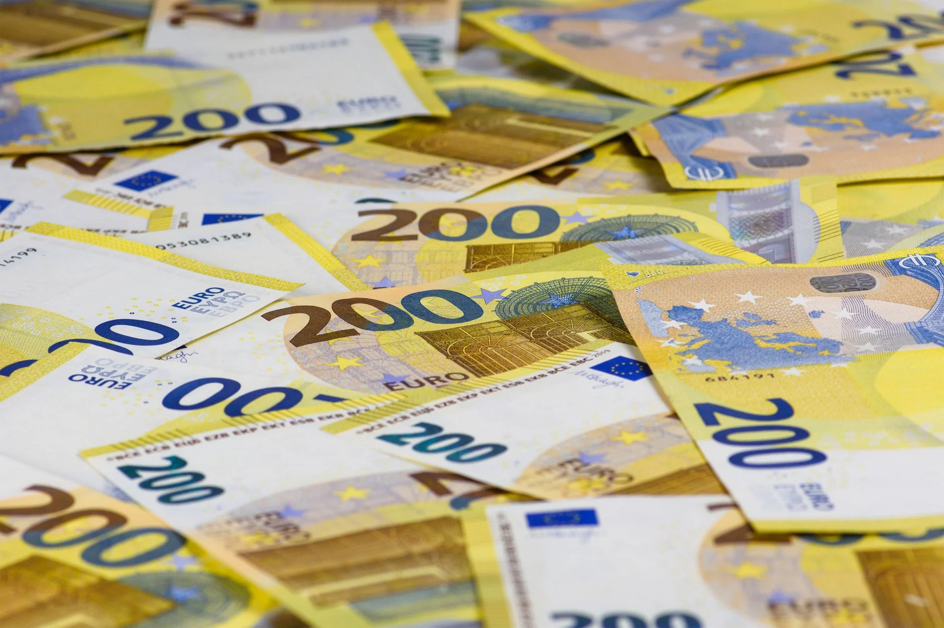 A detailed view of 200 Euro banknotes, ideal for themes of finance, currency, and wealth.