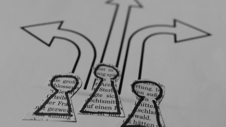 A close up of a piece of paper with arrows