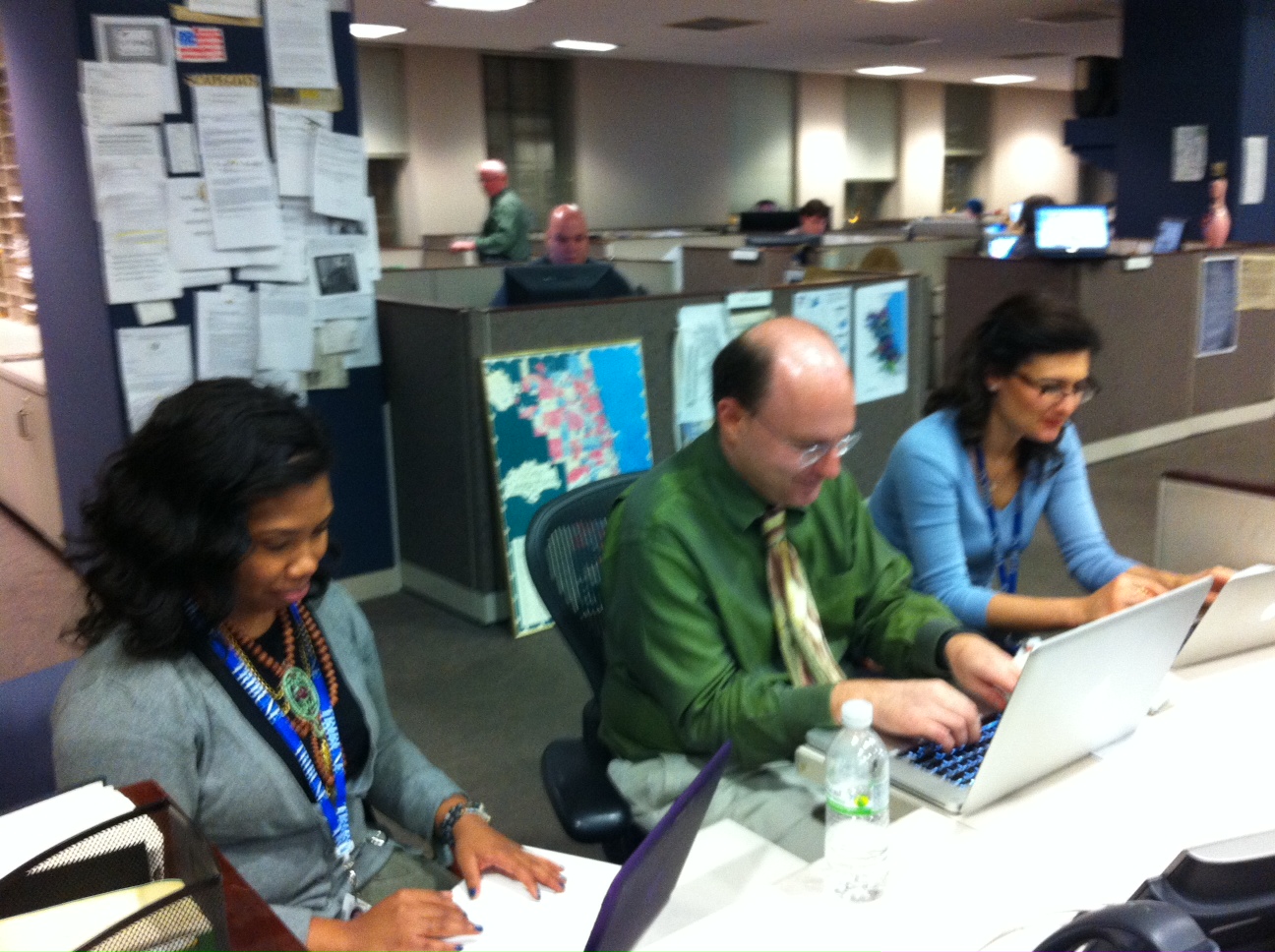Journalists working at computers in the Chicago Tribune newsroom