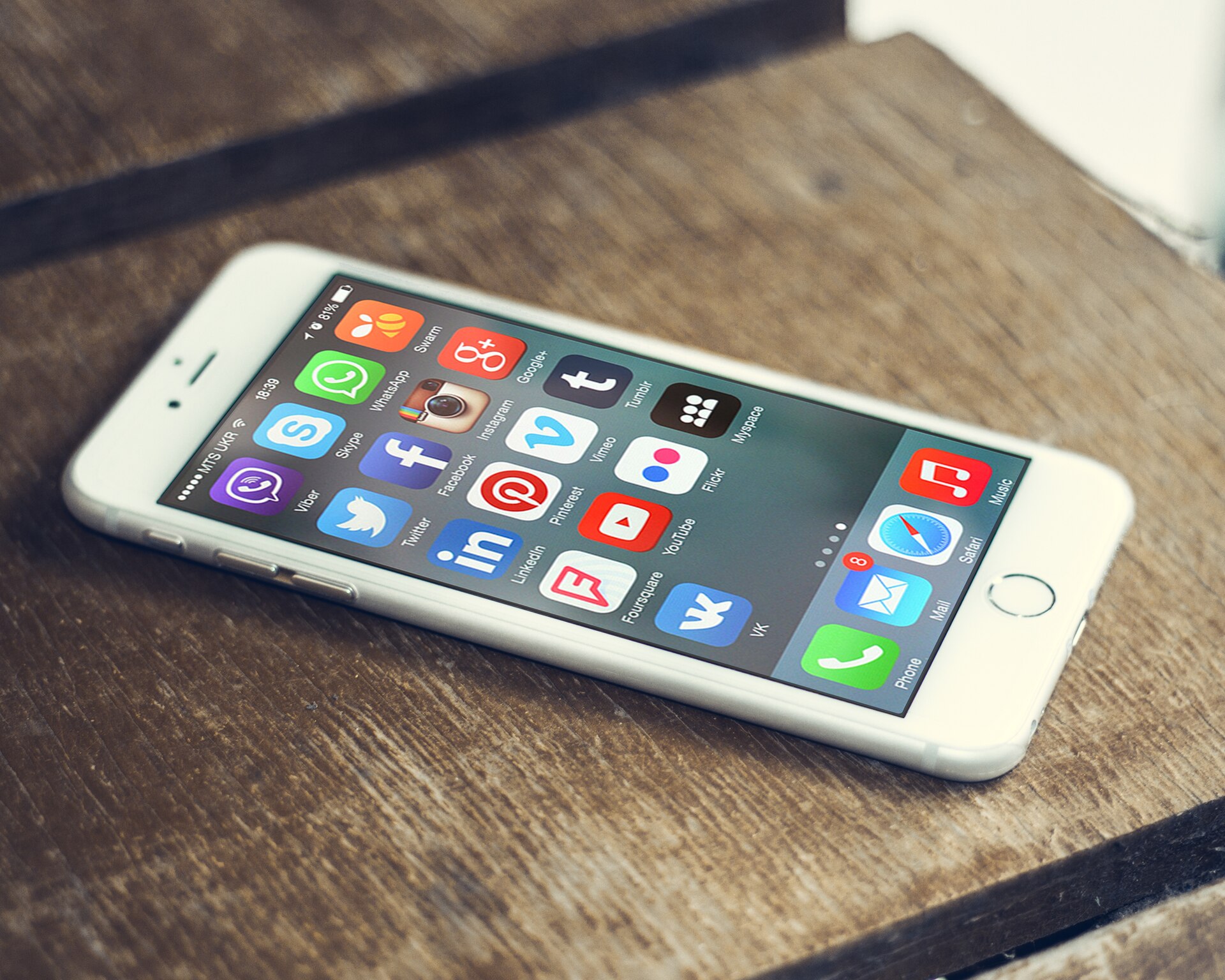 Social media app icons on a smartphone home screen