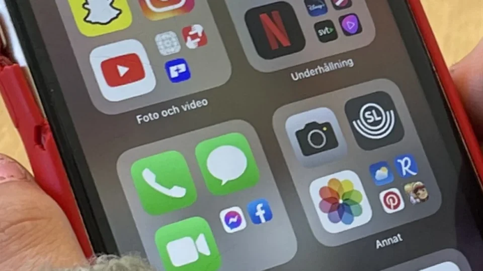 Smartphone screen showing a folder of social media apps
