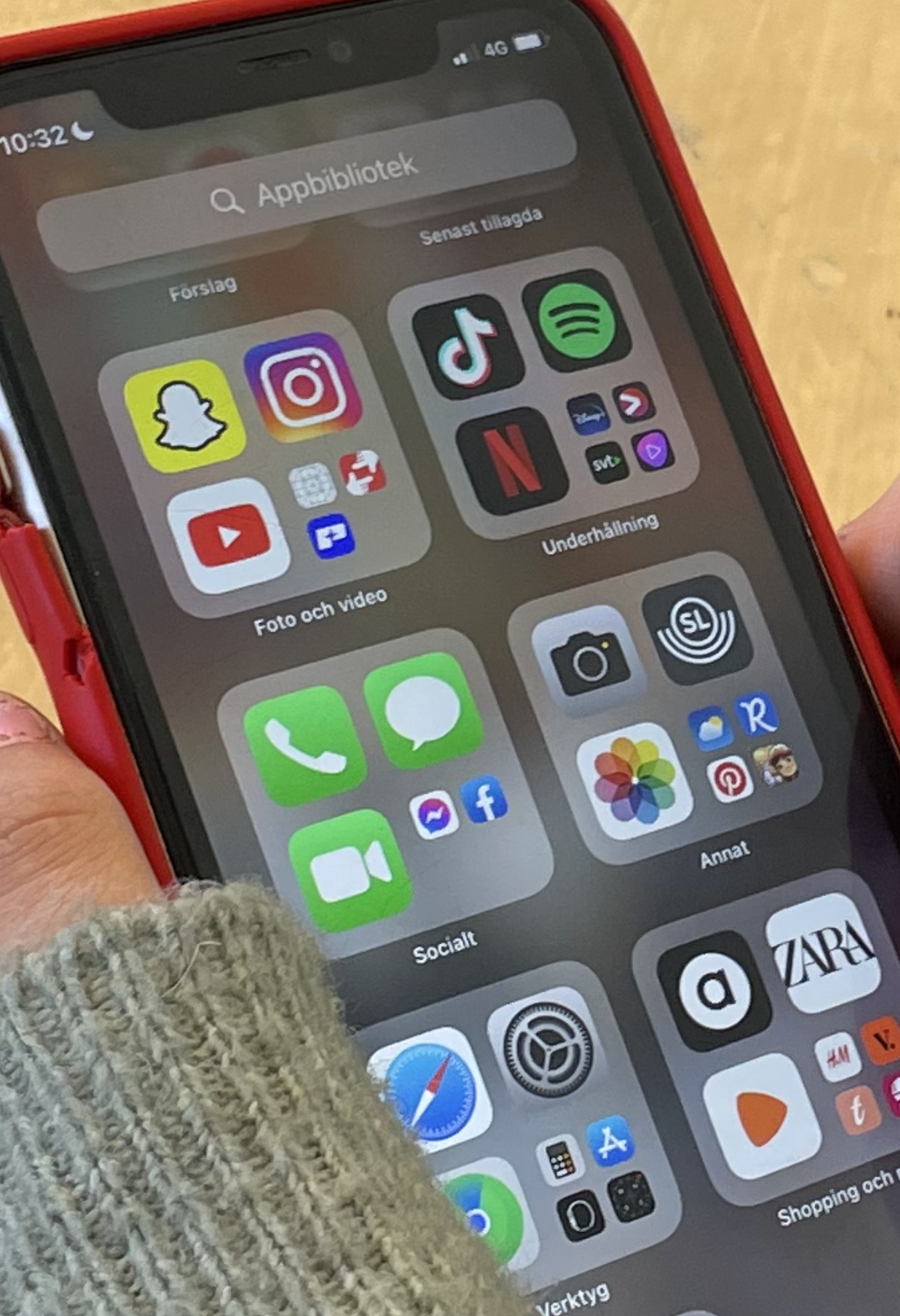 Smartphone screen showing a folder of social media apps