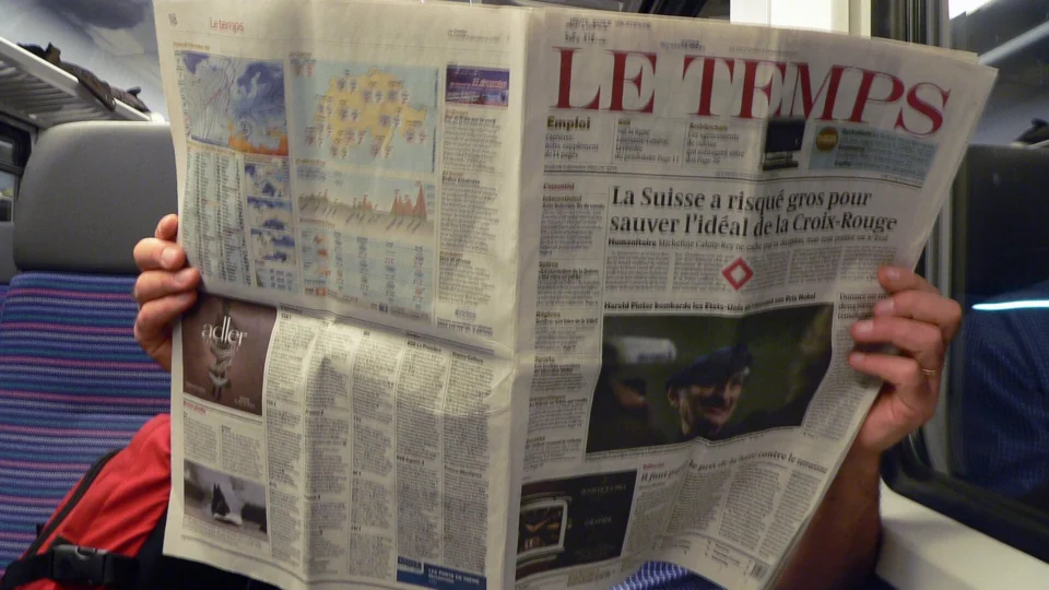 Front page of a printed broadsheet newspaper