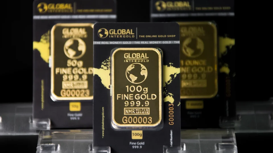 Focused image of 100g Intergold bars showcasing fine gold quality and luxury.