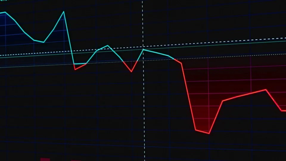 Visual representation of a fluctuating stock market chart with red and green lines.