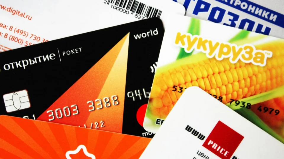 A mix of various credit and gift cards, showcasing a close-up view.