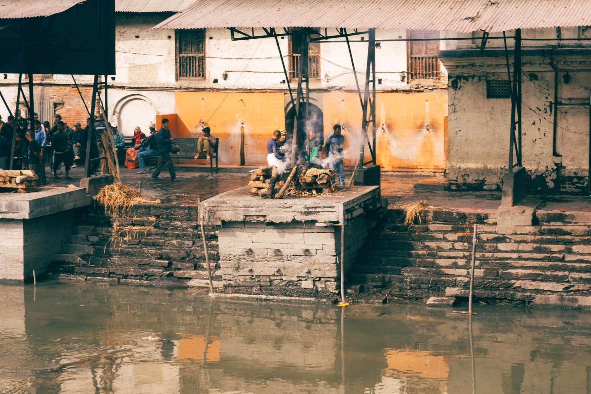 Cremation rituals along the Bagmati River at Pashupatinath Temple, a UNESCO World Heritage Site in Kathmandu, Nepal.