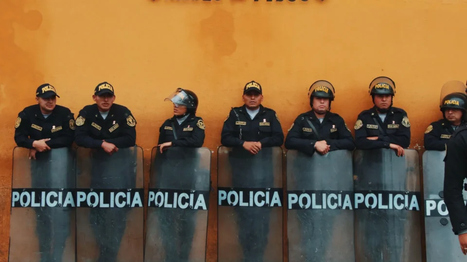 Peruvian police in uniform outside Museo del Pisco, Lima, Peru.