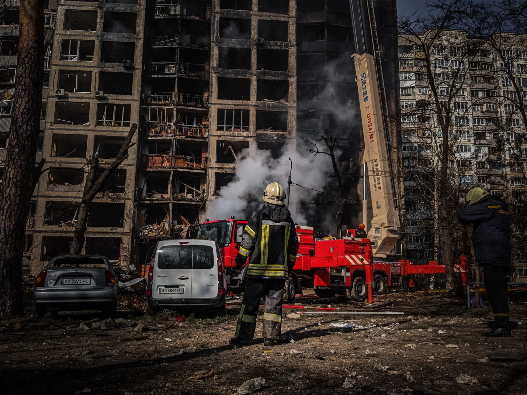 Firefighters tackle a blaze in a damaged building in Kyiv, Ukraine.