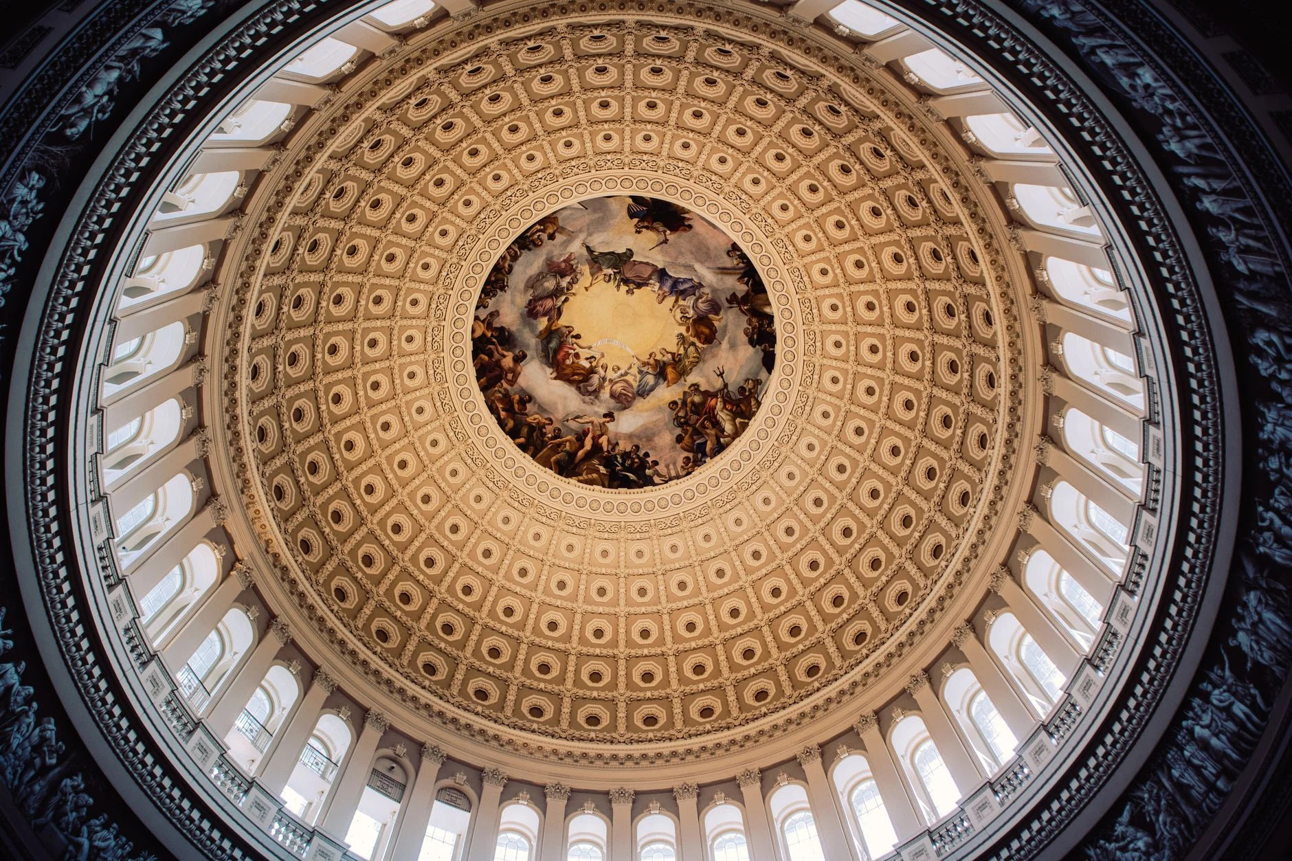 Stunning view of the United States Capitol Rotunda's ornate dome from below.