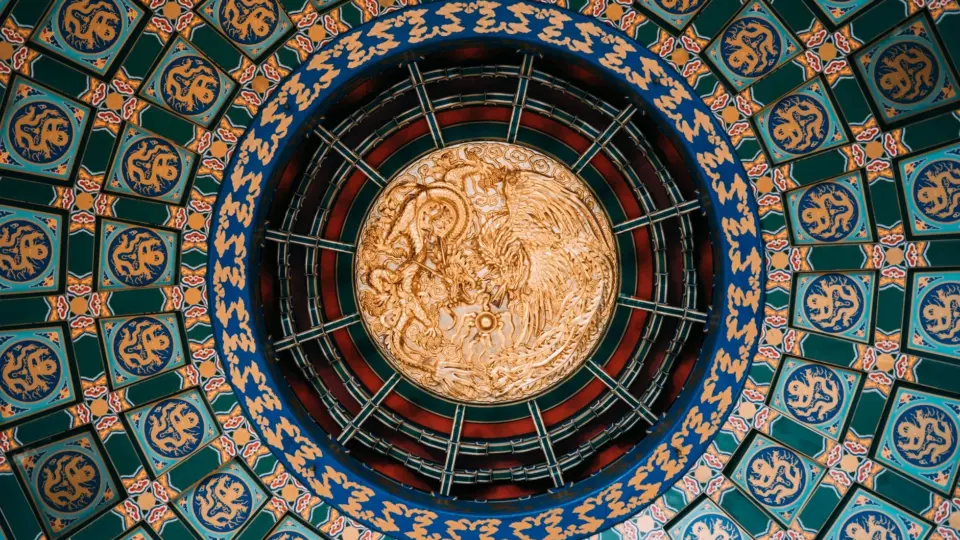 Beautifully decorated ceiling with ornate patterns at Epcot's China Pavilion in Walt Disney World.