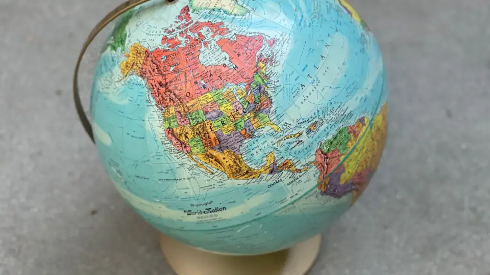 Vintage globe displaying North America and surrounding regions, ideal for geography concepts.